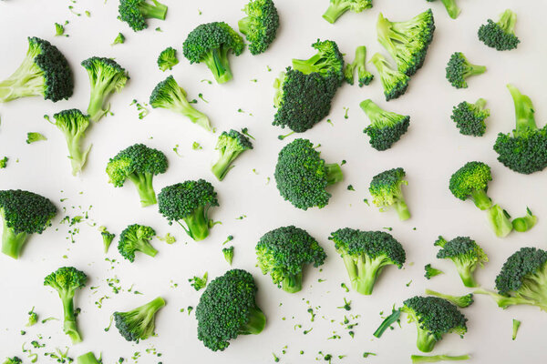 Pattern with broccoli on white background.