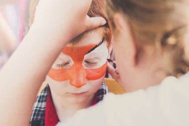 Çocuk çocuk yüz boyama, Kaplan gözü işlem yapma