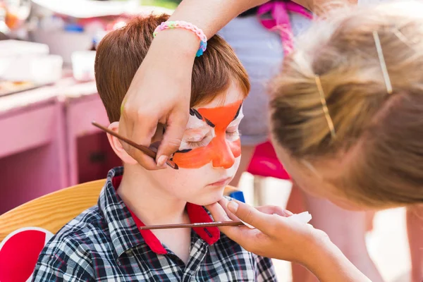 Çocuk çocuk yüz boyama, Kaplan gözü işlem yapma