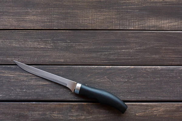Nóż na rustykalne drewniane tło, miejsce — Zdjęcie stockowe