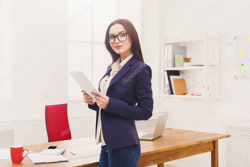 Businesswoman in modern office copy space
