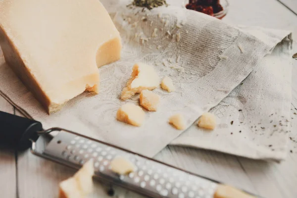 Parmesan piece closeup with small grater — Stock Photo, Image