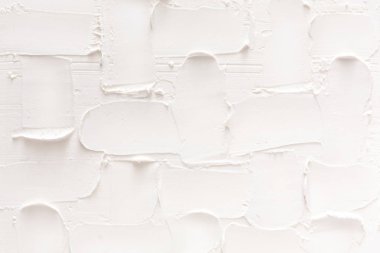 Beyaz tuğla duvar, sıva desen dokulu