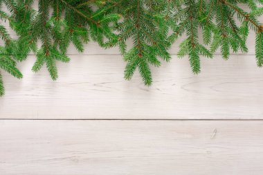 Noel ağacı dalları arka planda