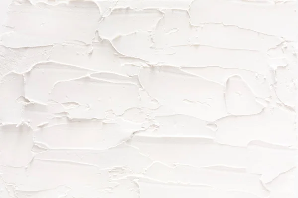 Белая стена на фоне гипсового рисунка — стоковое фото