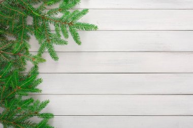 Noel ağacı dalları arka planda