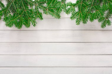 Noel ağacı dalları arka planda