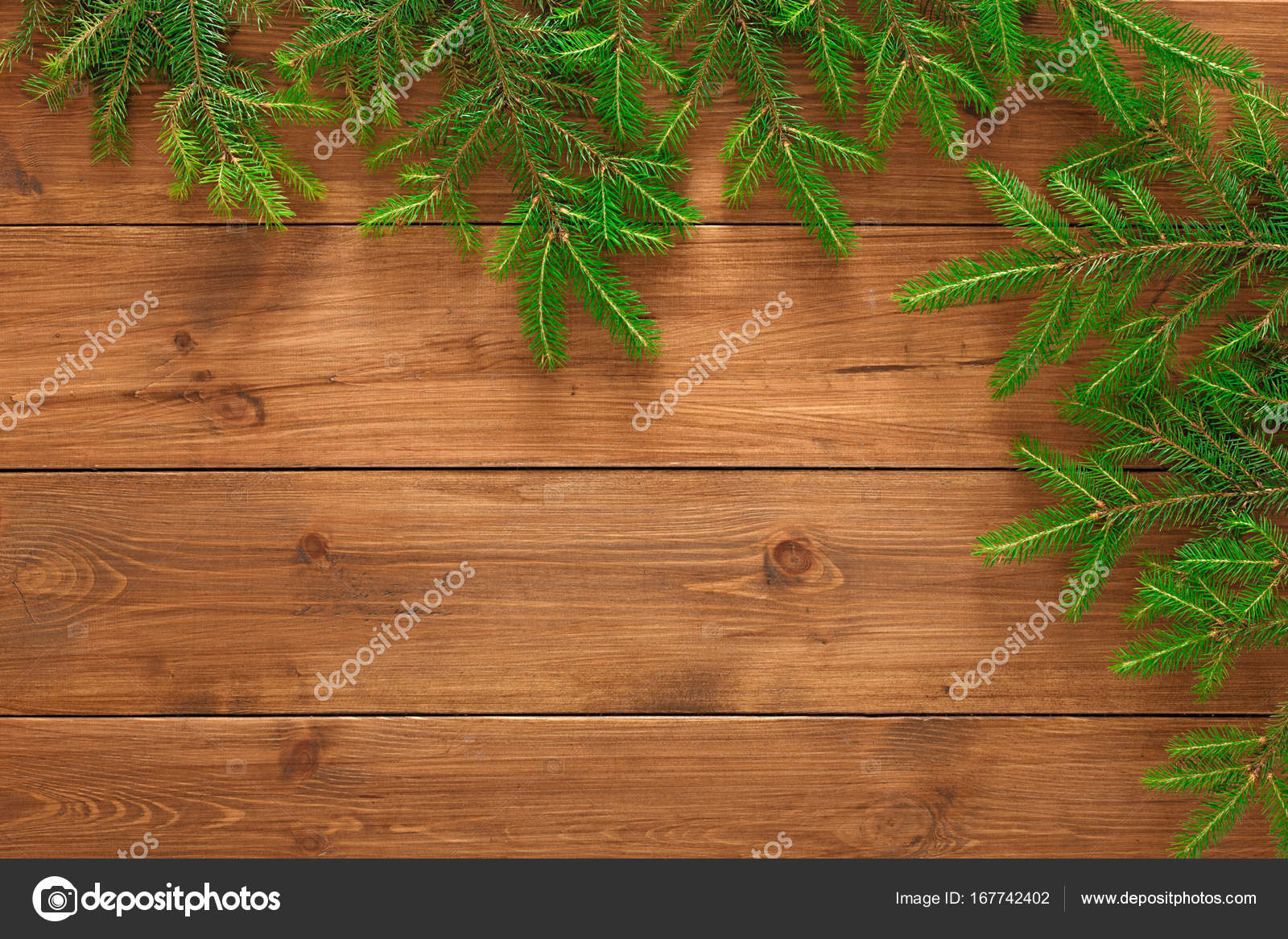 Christmas tree branches background Stock Photo by ©Milkos 167742402