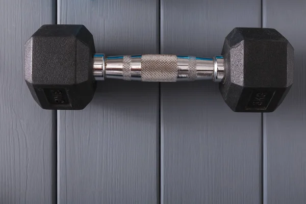 Dumbbell on grey background top view copy space — Stock Photo, Image