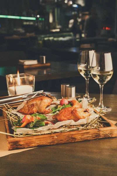 Dinner for two. Quails baked with asparagus and chanterelles — Stock Photo, Image