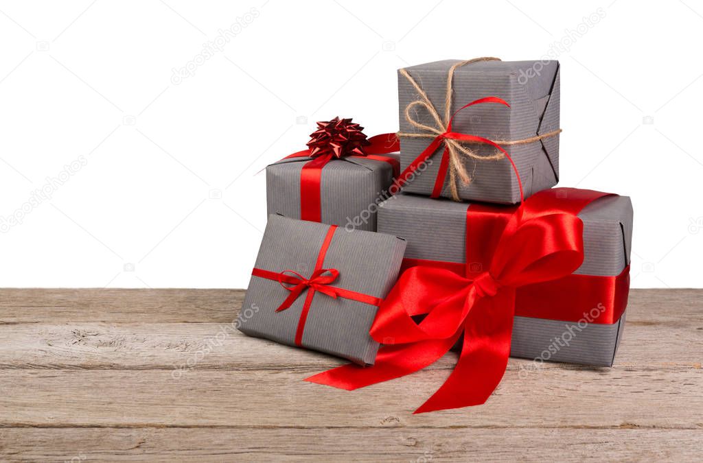 Christmas holiday gift boxes wrapped in paper on white background