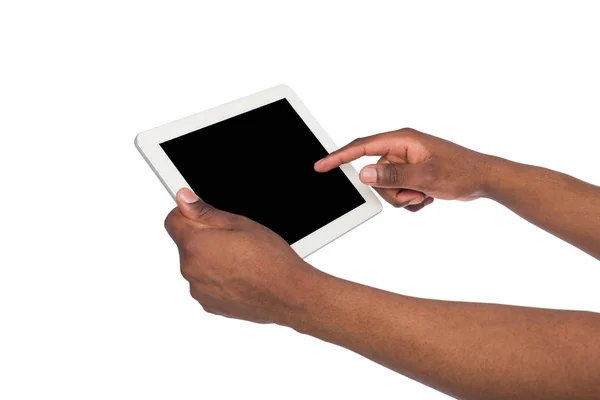 Holding and pointing on blank screen of tablet — Stock Photo, Image