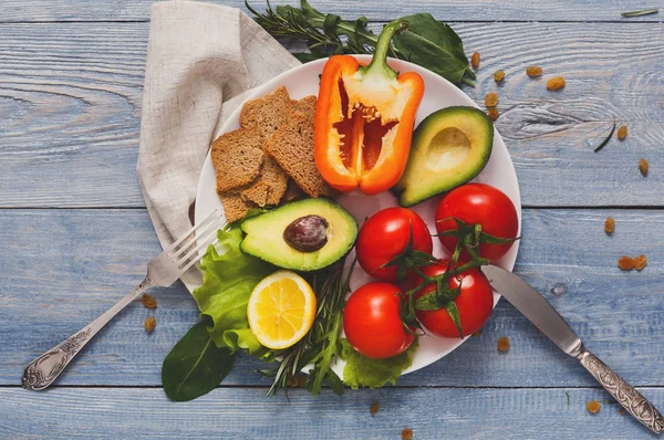 Fresh vegetables nutrition on blue wood background with copy space — Stock Photo, Image