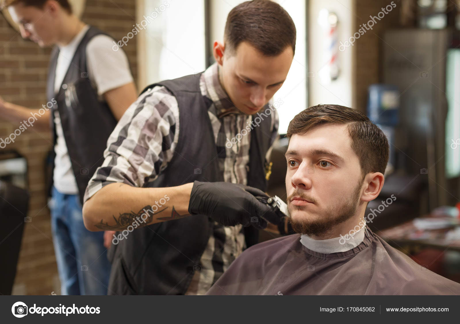 Man getting haircut by hairstylist at — Stock Photo © Milkos