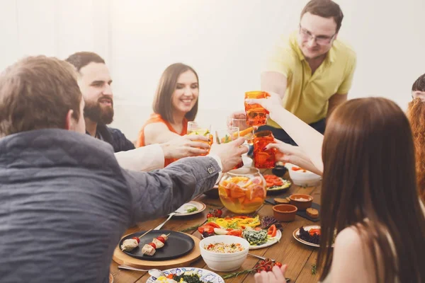 People say cheers clink glasses at festive table dinner party — Stock Photo, Image