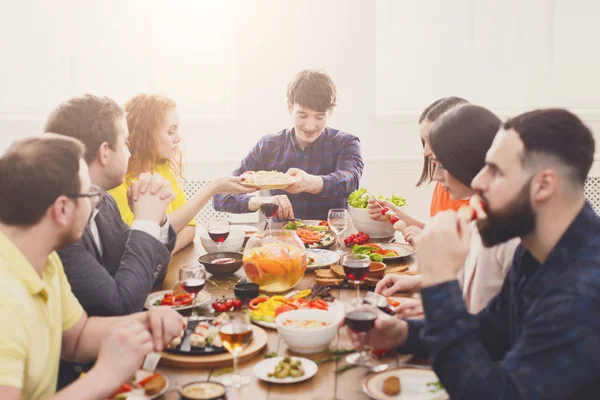 Group of people at festive table dinner party — Stock Photo, Image