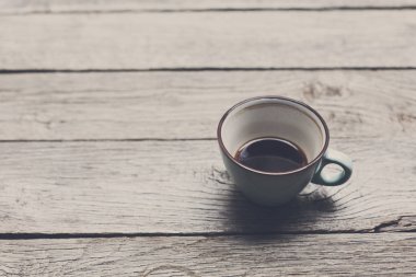 Rustik ahşap arka plan üzerinde fincan Espresso kahve