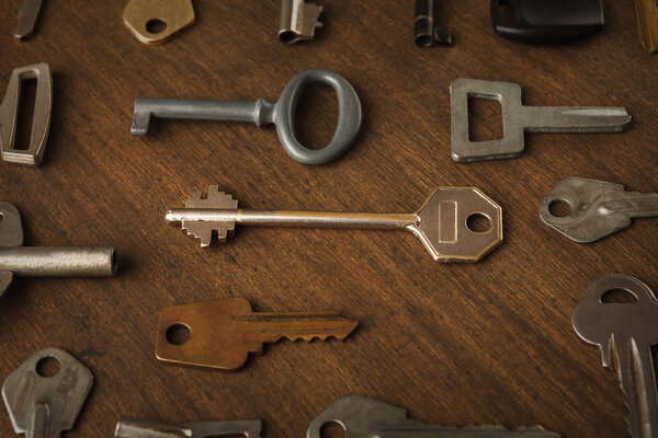 Many different keys on wood