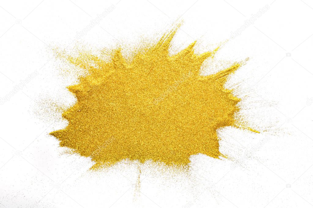 Golden glitter sand texture on white background