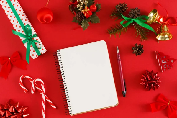 Wish list for xmas. Women hands with notebook and pen — Stock Photo, Image