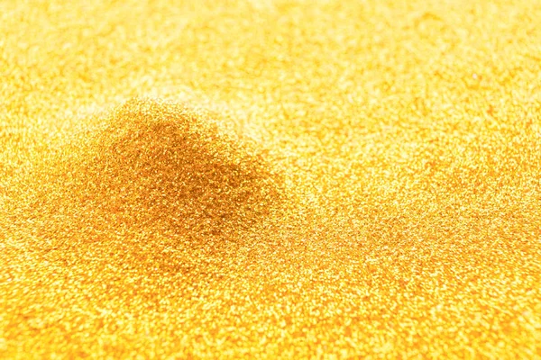 Golden glitter pile, bright luxury background — Stock Photo, Image