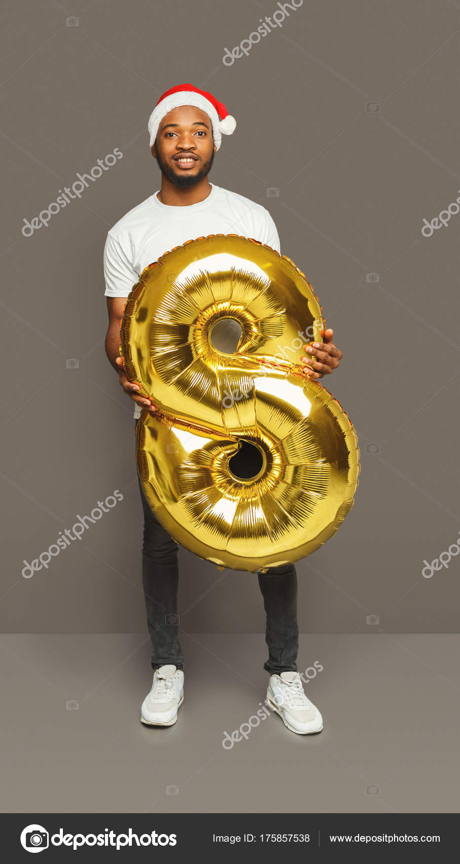 African american boy in santa hat at studio background e of shots to pose 2018 for new year and christmas greeting card — by Milkos