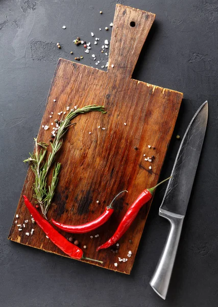 Chilli on wooden board, top view — Stock Photo, Image