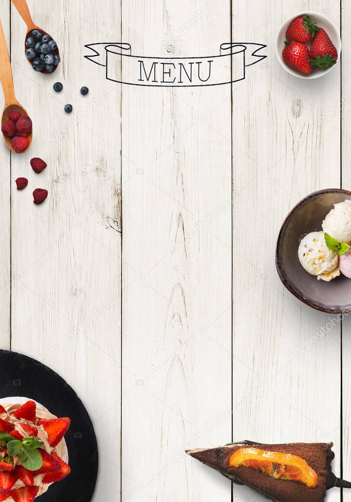 Design concept for restaurant dessert menu mockup. White rustic wooden board with white inscription and sweet snacks, top view, copy space for text and logo