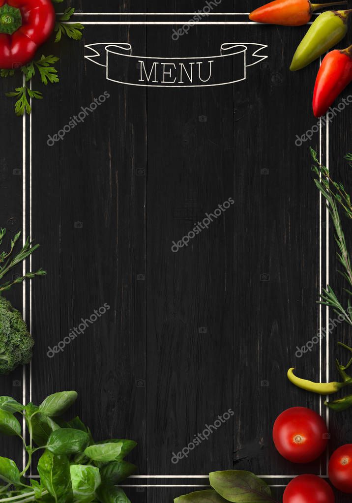 Design concept for restaurant menu mockup. Black rustic wooden board with white inscription and vegetables frame, top view, copy space for text and logo