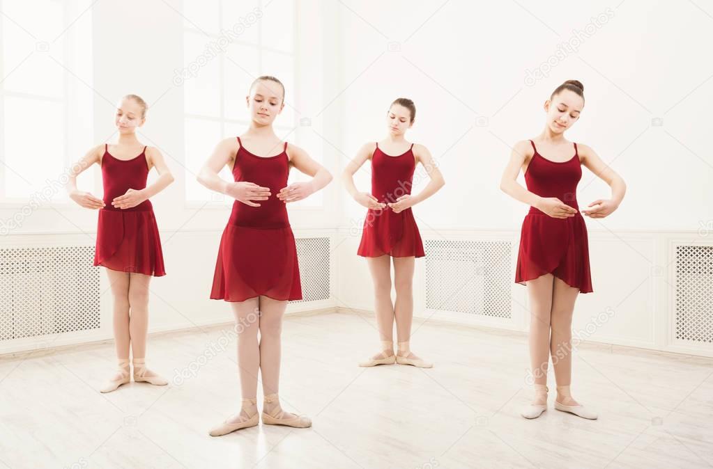 Young girls dancing ballet in studio