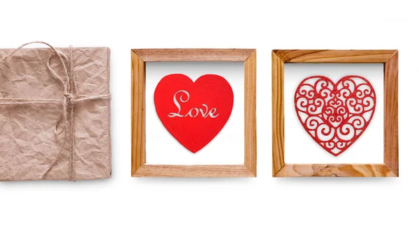 Colagem corações artesanais em moldura de madeira isolada em branco — Fotografia de Stock