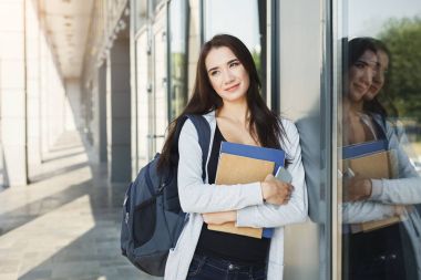 Öğrenci kız kitapları Üniversitesi arka plan ile