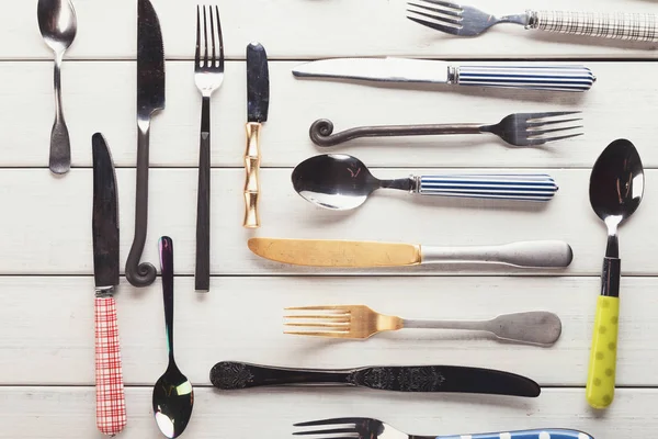 Collection of modern and antique cutlery, top view — Stock Photo, Image