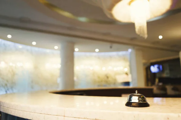 Hotel accommodation call bell on reception desk — Stock Photo, Image