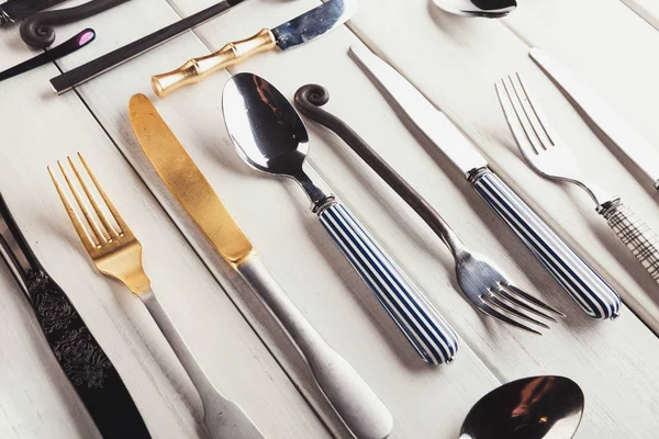 Collection of modern and antique cutlery — Stock Photo, Image