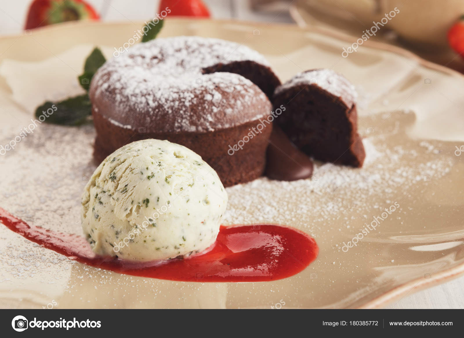 Chocolate Fondant With Vanilla Ice Cream And Strawberry Stock