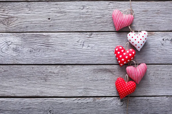 Valentine day background, hearts bunch on wood