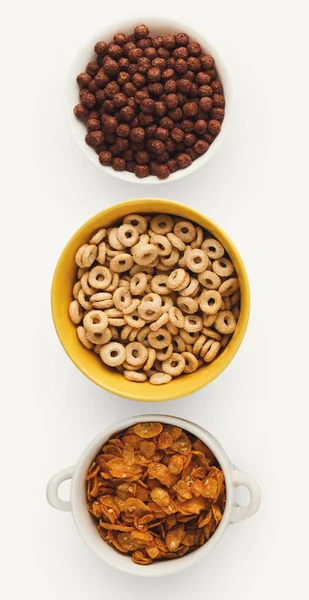 Set of bowls with quick breakfast cereals, isolated — Stock Photo, Image