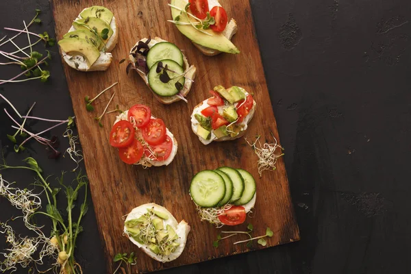 Variety of healthy vegetarian sandwiches — Stock Photo, Image