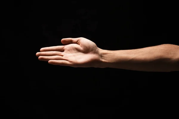 El üstünde siyah izole el sıkışma için hazır — Stok fotoğraf