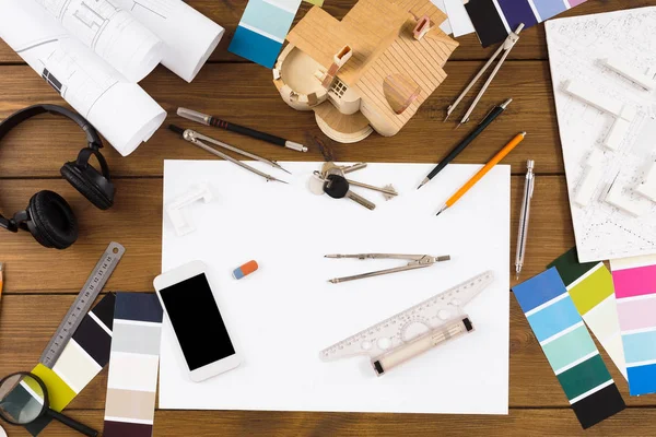 Decorator workplace with color swatches and tools — Stock Photo, Image