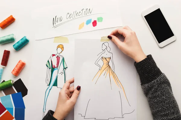 Top view on woman designer drawing clothes sketches — Stock Photo, Image