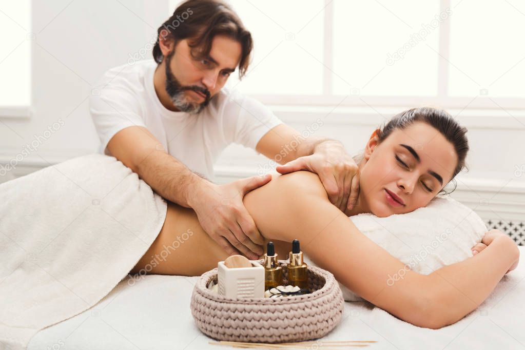 Classical body massage at spa salon