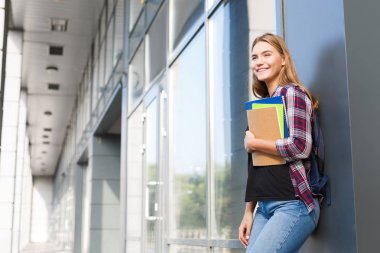 Öğrenci kız kitapları Üniversitesi arka plan ile
