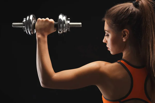 Athletic woman with dumbbell — Stock Photo, Image