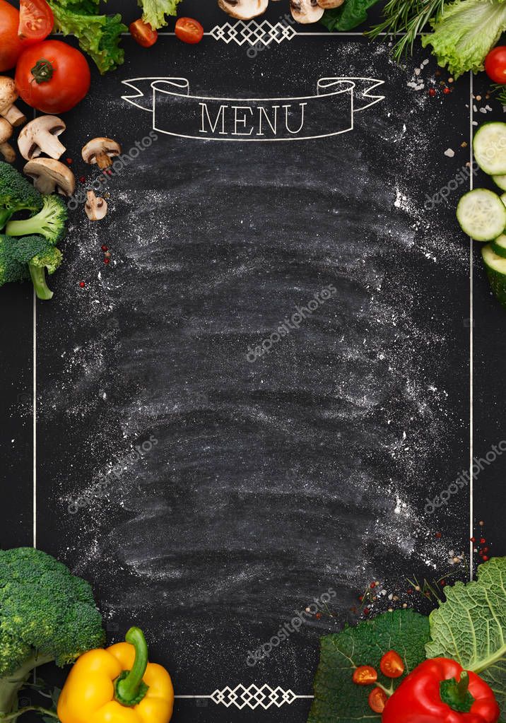 Design concept for restaurant menu mockup. Black rustic chalkboard with white inscription and vegetables frame, top view, copy space for text and logo, vegetarian cafe concept