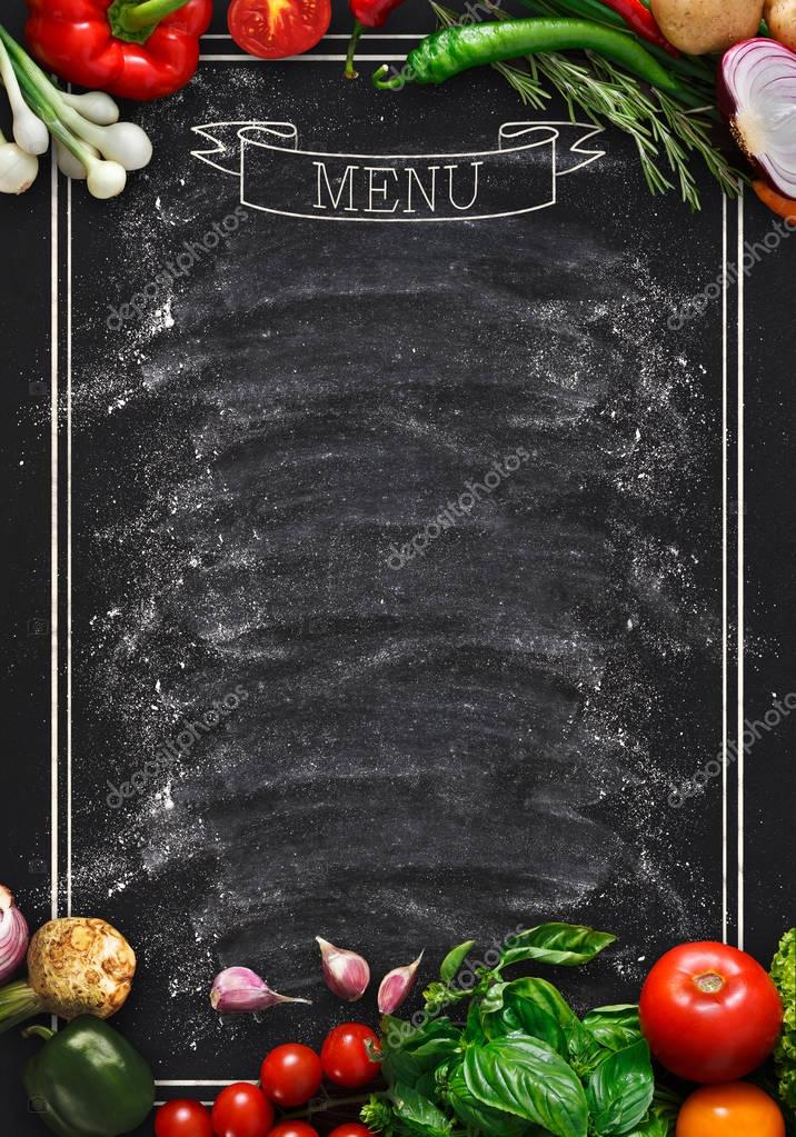 Design concept for restaurant menu mockup. Black rustic chalkboard with white inscription and vegetables frame, top view, copy space for text and logo, vegetarian cafe concept