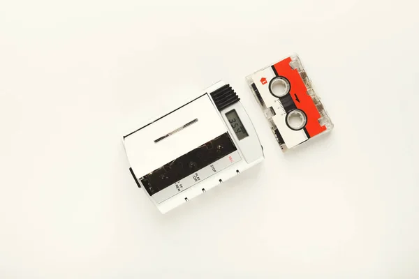 Vintage walkman and cassette tape on white isolated background — Stock Photo, Image