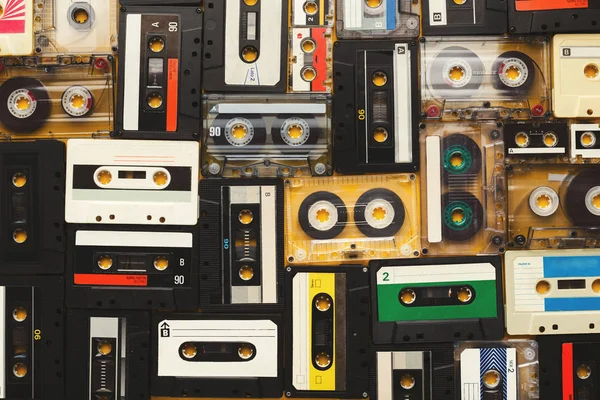 Vintage audio cassettes beige background