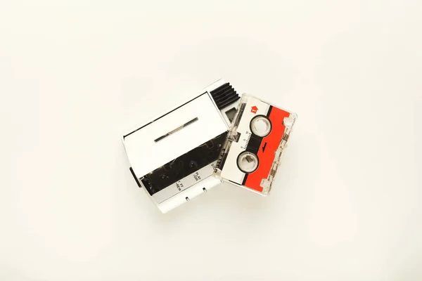 Vintage walkman and cassette tape on white isolated background — Stock Photo, Image